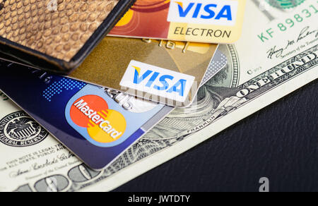 Moscowi, Russia - August 05, 2017:  Visa and Mastercard credit cards in wallet close up Stock Photo