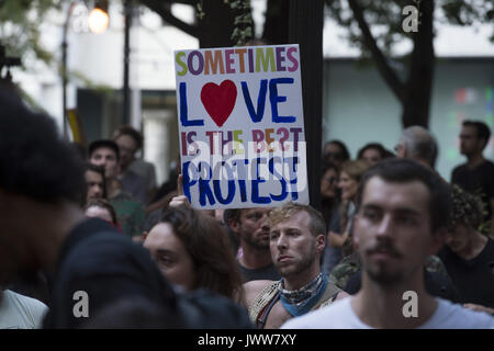 Atlanta, GA, USA. 13th Aug, 2017. Anti-Fascist protestors gather in downtown Atlanta and march along Peachtree Street, showing their support of those who demonstrated against white supremacist group in Charlottesville, VA. Rally organized by Antifa, an organization nationally that fights fascism.Pictured: Credit: Robin Rayne Nelson/ZUMA Wire/Alamy Live News Stock Photo