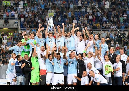 Rome, Italy. 13th Aug, 2017. Lazio players celebrating with the trophy during the Italian Supercup match between Juventus and SS Lazio at Stadio Olimpico on August 13, 2017 in Rome, Italy Credit: marco iorio/Alamy Live News Stock Photo