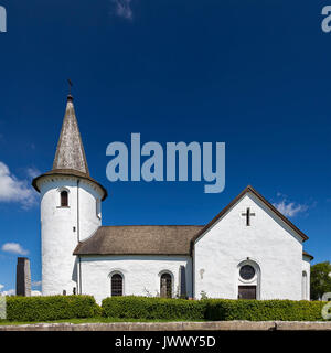 Medieval white washed church in Bollerup, Sweden. Stock Photo