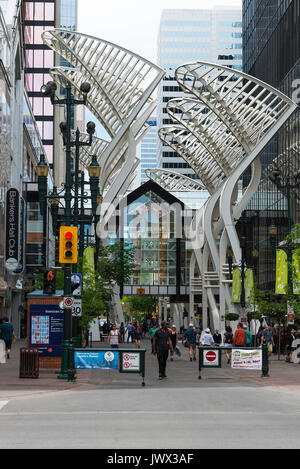 The Pedestrianised 8 Avenue SW near The Entrance to Core Shopping Centre, Shops, Bars and Restaurants in Downtown Calgary Alberta Canada Stock Photo