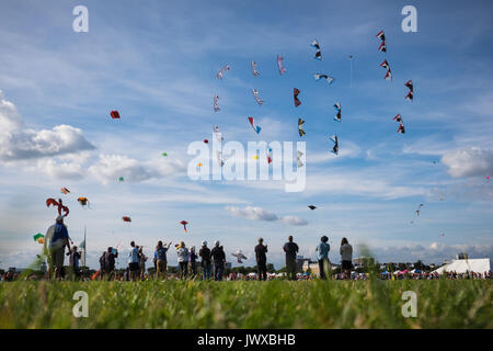 People at the Portsmouth International Kite Festival 2017, on what was the 26th anniversary for the festival held on Southsea Common Stock Photo