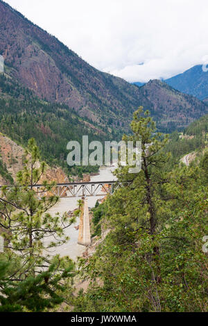 Railway Bridge Over The Fraser River near Lillooet British Columbia Canada Stock Photo