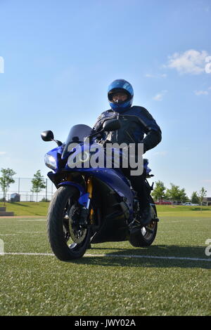 Rider On The  Football Field Stock Photo