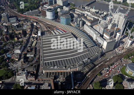 Aerial view of Waterloo station, London Eye, Big Ben and the Houses ...