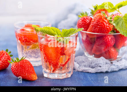 strawberry drink in glass and on a table Stock Photo