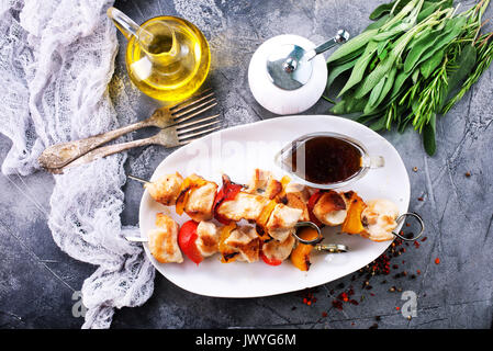 chicken kebab with vegetables on the plate Stock Photo