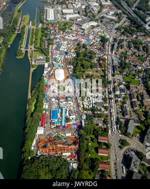 582. Cranger fair, fairground carousel, roller coaster, Ferris wheel, observation tower, rides, fair attractions, festival, audience chains karussel,  Stock Photo