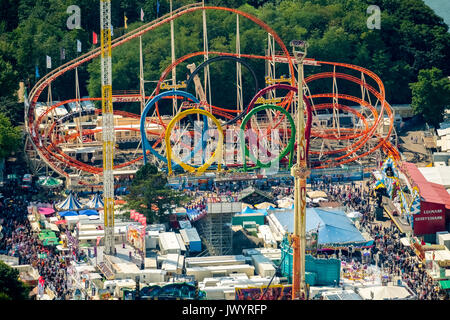 582. Cranger fair, fairground carousel, roller coaster, Ferris wheel, observation tower, rides, fair attractions, festival, audience chains karussel,  Stock Photo