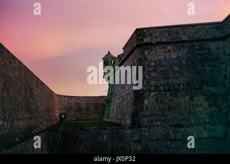 Stone walls and a dry moat surrounding the Fuerte de San Miguel or Fort St Michael in Campeche, Mexico. Turret or guard post. Vintage 1996 - kodak film. Stock Photo