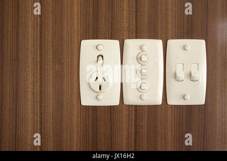 Retro vintage light switches and plug socket Stock Photo