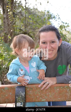 A mother and daughter spending time in the park. Stock Photo