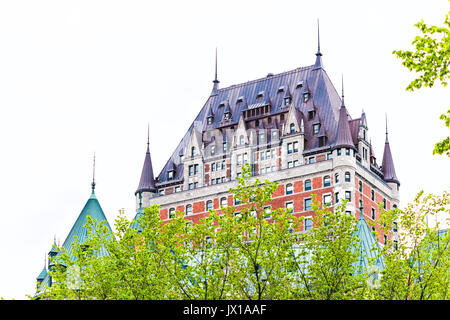 Quebec City, Canada - May 30, 2017: View of Chateau Frontenac by old town during summer with green trees Stock Photo