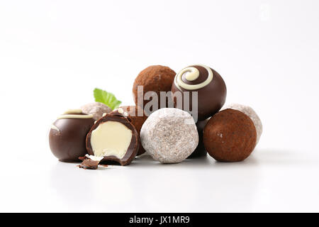 Assorted chocolate truffles and pralines with ganache filling Stock Photo