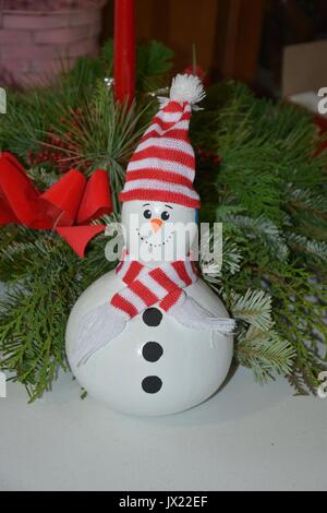 Snowman decoration made from a gourd. Stock Photo