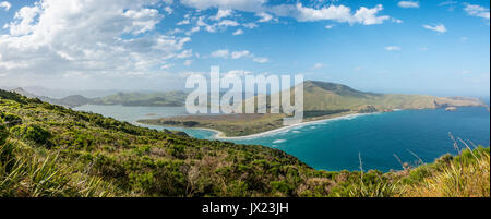 Hoopers Inlet and Allan's Beach, green landscape by the sea, view from Sandymount, Otago, South Island, New Zealand Stock Photo
