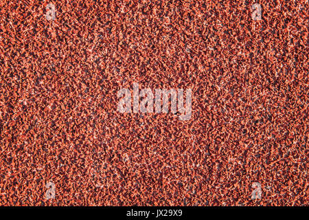Red Color Rubber Surface or Running Track Texture as Background Stock Photo