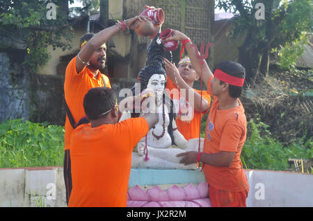 Agartala, India. 14th Aug, 2017. Devotees participate in the Kanwar Yatra pilgrimage on the occasion of Sawan festival in Agartalar, in the northeastern state of Tripura. Credit: Abhisek Saha/Pacific Press/Alamy Live News Stock Photo