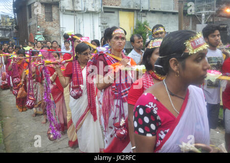 Agartala, India. 14th Aug, 2017. Devotees participate in the Kanwar Yatra pilgrimage on the occasion of Sawan festival in Agartalar, in the northeastern state of Tripura. Credit: Abhisek Saha/Pacific Press/Alamy Live News Stock Photo