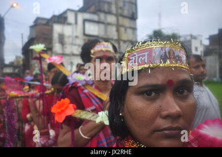 Agartala, India. 14th Aug, 2017. Devotees participate in the Kanwar Yatra pilgrimage on the occasion of Sawan festival in Agartalar, in the northeastern state of Tripura. Credit: Abhisek Saha/Pacific Press/Alamy Live News Stock Photo