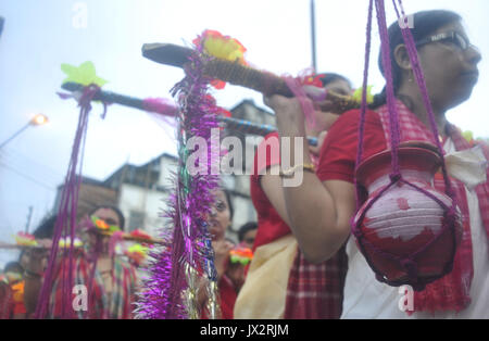 Agartala, India. 14th Aug, 2017. Devotees participate in the Kanwar Yatra pilgrimage on the occasion of Sawan festival in Agartalar, in the northeastern state of Tripura. Credit: Abhisek Saha/Pacific Press/Alamy Live News Stock Photo