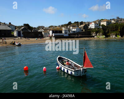 Fishing boats moored off the beach at Gorran Haven, Cornwall. Stock Photo