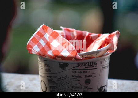 empty chip cup or box with square pattern paper. From the Murrayfield Rugby Stadium in Edinburgh. Stock Photo