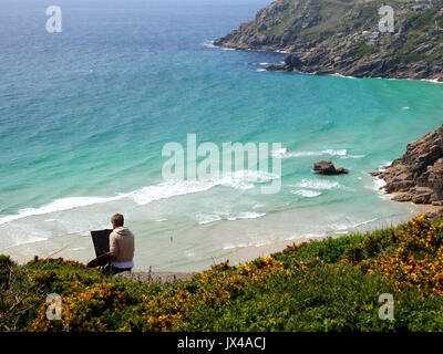 An artist at work at Treen Cliff near Porthcurno, Cornwall. Stock Photo