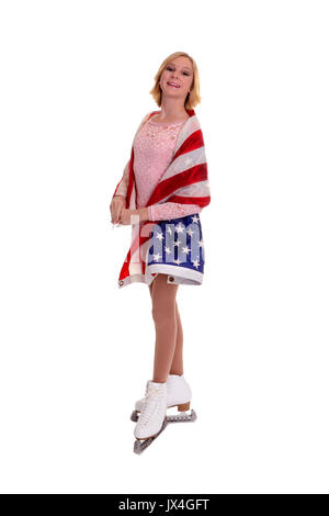 A happy teenage figure skater draped in American flag Stock Photo