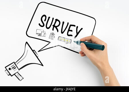 Survey concept. Megaphone and text on a white background. Stock Photo