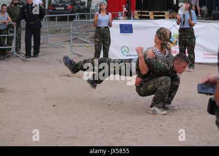 performance of the millitary-patriotic club 'Patriot' on traditional festival 'Uxa Fest', August,12,2017, Vileyka sea, Belarus Stock Photo