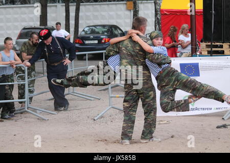 performance of the millitary-patriotic club 'Patriot' on traditional festival 'Uxa Fest', August,12,2017, Vileyka sea, Belarus Stock Photo