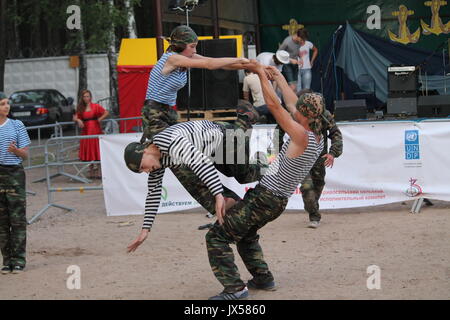 performance of the millitary-patriotic club 'Patriot' on traditional festival 'Uxa Fest', August,12,2017, Vileyka sea, Belarus Stock Photo