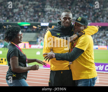 London, UK. 13th Aug, 2017. Usain BOLT with his parents Wellesley and Jennifer Bolt as he bids farewell to the track during the Final Day of the IAAF World Athletics Championships (Day 10) at the Olympic Park, London, England on 13 August 2017. Photo by Andy Rowland/PRiME Media Images. Credit: Andrew Rowland/Alamy Live News Stock Photo