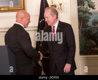 Washington, Us. 14th Aug, 2017. National Security Advisor H.R. McMaster (left) greets Dr. Thomas A. Kennedy, Chairman and Chief Executive Officer for Raytheon Company (right) at the signing of a memorandum addressing China's laws, policies, practices, and actions related to intellectual property, innovation, and technology at The White House in Washington, DC, August 14, 2017. Credit: Chris Kleponis/Pool CNP - NO WIRE SERVICE · Photo: Chris Kleponis/Consolidated/dpa/Alamy Live News Stock Photo