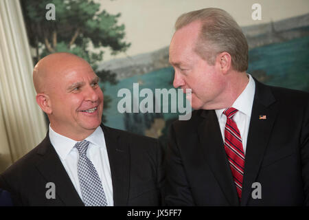 Washington, Us. 14th Aug, 2017. National Security Advisor H.R. McMaster (left) speaks with Dr. Thomas A. Kennedy, Chairman and Chief Executive Officer for Raytheon Company (right) at the signing of a memorandum addressing China's laws, policies, practices, and actions related to intellectual property, innovation, and technology at The White House in Washington, DC, August 14, 2017. Credit: Chris Kleponis/Pool CNP - NO WIRE SERVICE · Photo: Chris Kleponis/Consolidated/dpa/Alamy Live News Stock Photo