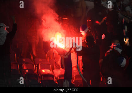 Ostsee Stadium in Rostock, Germany, 14 August 2017. Rostock hooligans set stadium seats on fire as welk as a Berlin banner during the DFB Cup match pitting Hansa Rostock vs Hertha BSC at the Ostsee Stadium in Rostock, Germany, 14 August 2017. The game was interrupted at minute 76 due to riots amongst spectators. Credit: dpa picture alliance/Alamy Live News Stock Photo