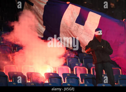 Ostsee Stadium in Rostock, Germany, 14 August 2017. dpatop - Rostock hooligans set stadium seats on fire as welk as a Berlin banner during the DFB Cup match pitting Hansa Rostock vs Hertha BSC at the Ostsee Stadium in Rostock, Germany, 14 August 2017. The game was interrupted at minute 76 due to riots amongst spectators. Credit: dpa picture alliance/Alamy Live News Stock Photo