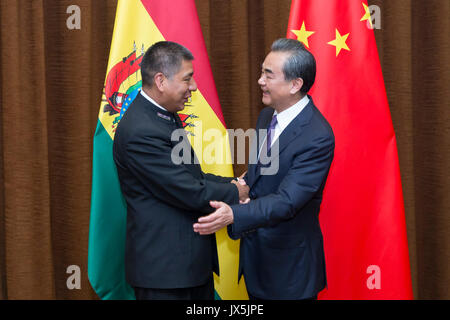 Beijing, China. 15th Aug, 2017. Chinese Foreign Minister Wang Yi (R) meets with Bolivia's Foreign Minister Fernando Huanacuni Mamani in Beijing, capital of China, Aug. 15, 2017. Credit: Cui Xinyu/Xinhua/Alamy Live News Stock Photo