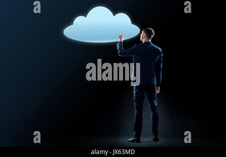 businessman touching virtual cloud hologram Stock Photo