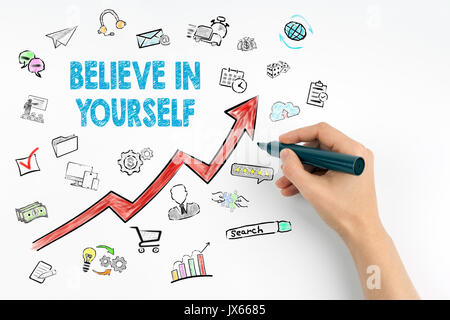 Believe In Yourself Concept. Hand with marker writing. Stock Photo