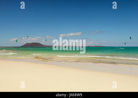 Kite surfers in Grande Playa in Fuerteventura in Canary Island Stock Photo