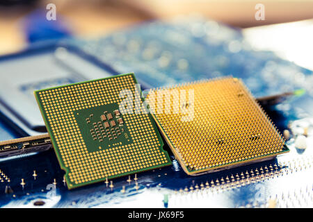 computer cpu or central processor unit chip on mainboard Stock Photo