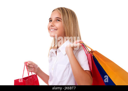 shopping, sale, christmas and holiday-happy teenage girl with shopping bags, isolated over white background Stock Photo