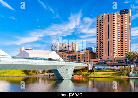 Adelaide, Australia - December 2, 2016: Adelaide city foot bridge leading to InterContinental hotel viewed through Torrens river on a bright day Stock Photo