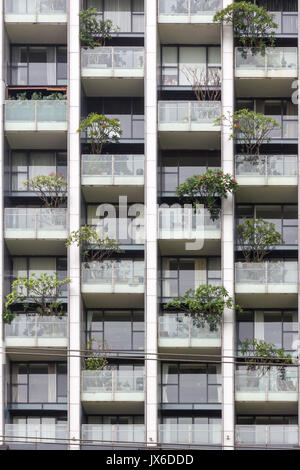 Apartment building windows on Sathorn Road, Bangkok, Thailand Stock Photo