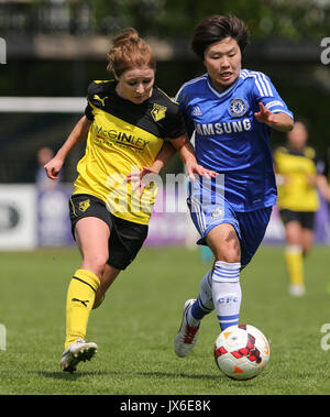 Sarah Wiltshire of Watford Ladies & Ji So-yun of Chelsea Ladies battle for the ball during the Continental Cup (Group One) match between Watford Ladie Stock Photo