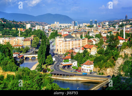 Aerial view of Sarajevo, the capital of Bosnia and Herzegovina, with Latin Bridge, Miljacka River, National Library and the modern city Stock Photo