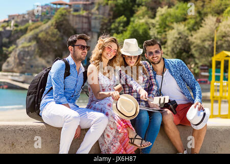 Group of friends taking funny portraits outdoor Stock Photo