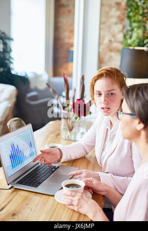 Financial Managers Wrapped up in Work Stock Photo